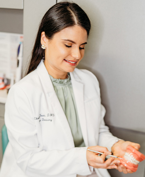 Doctor Troisi treating dental patient